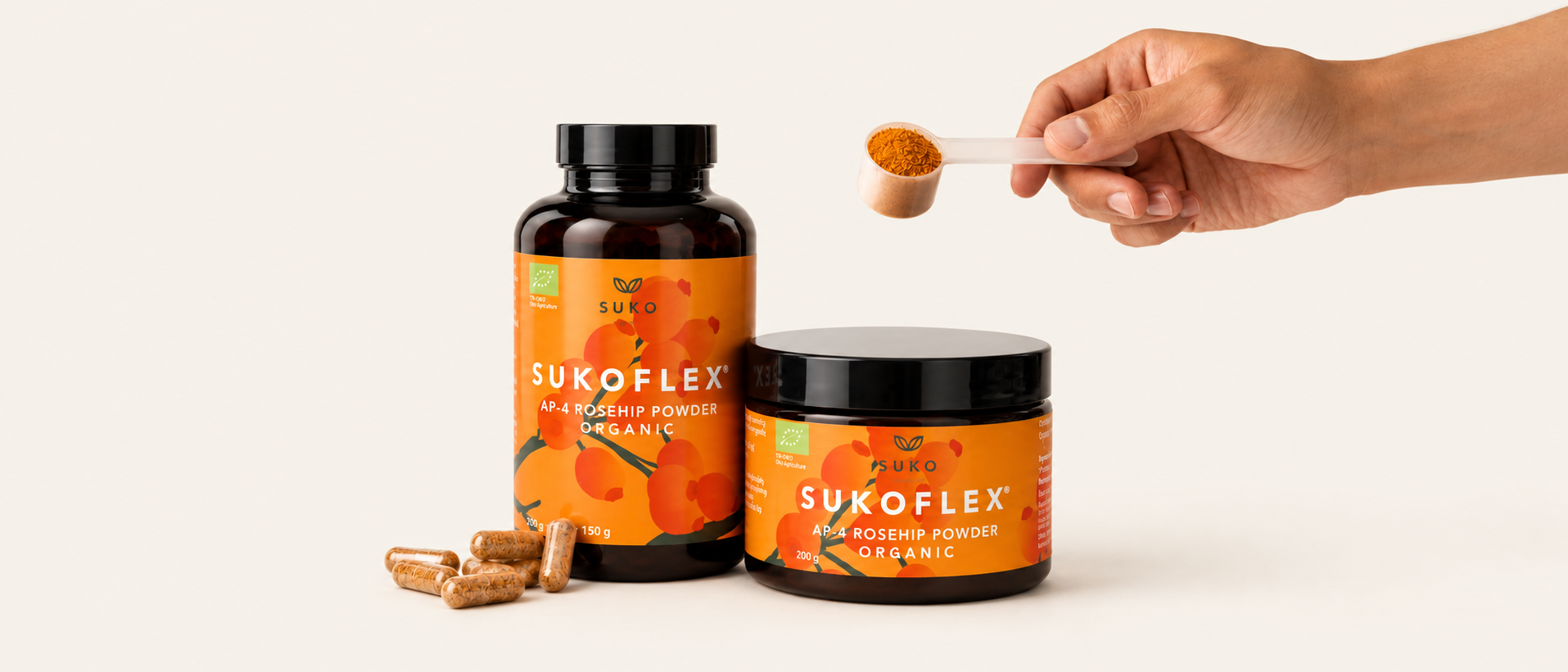 Branded SUKOFLEX® AP-4® rosehip powder jar and vegan capsule bottle, with a hand pouring a scoop of rosehip powder and loose capsules beside the jar