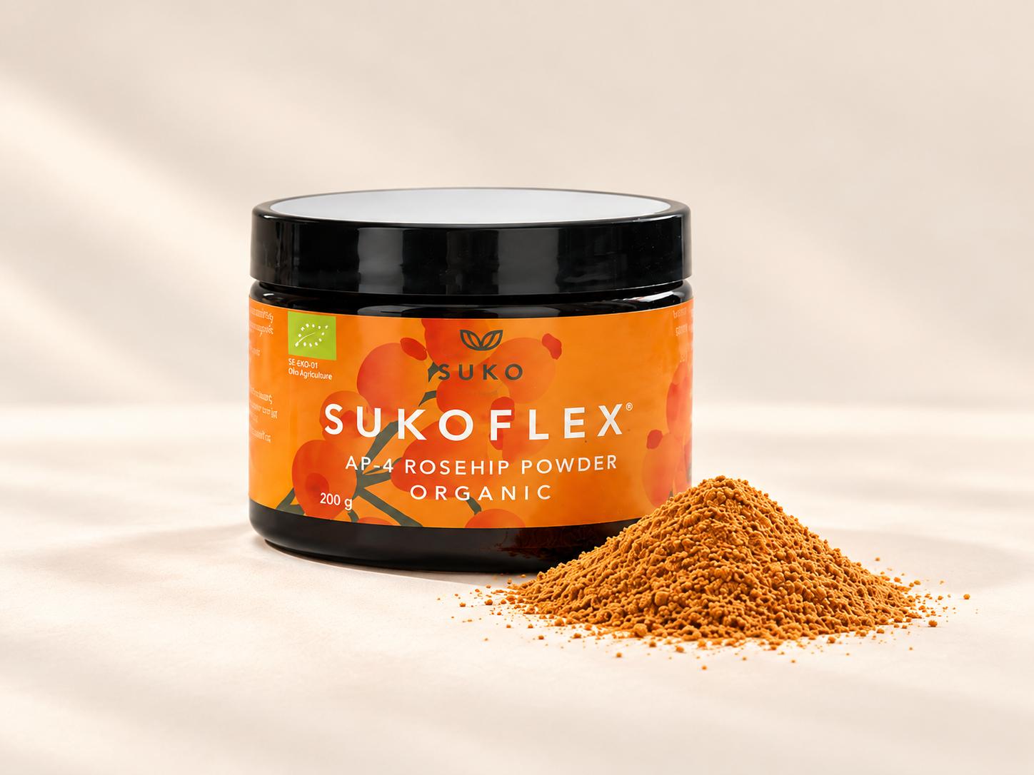 SUKOFLEX® AP-4® rosehip powder jar with a small mound of fine rosehip powder